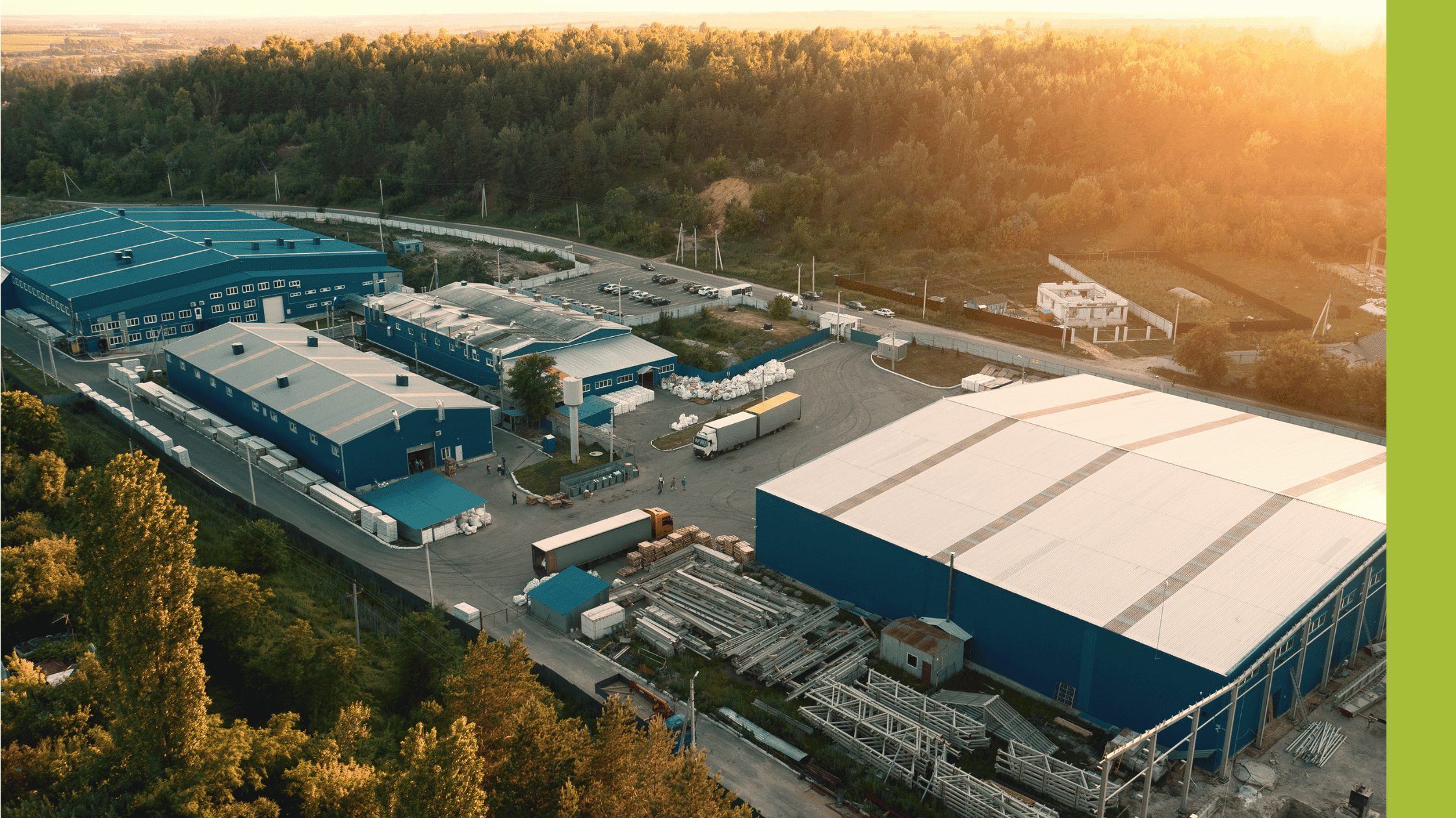 Sun rising over a factory