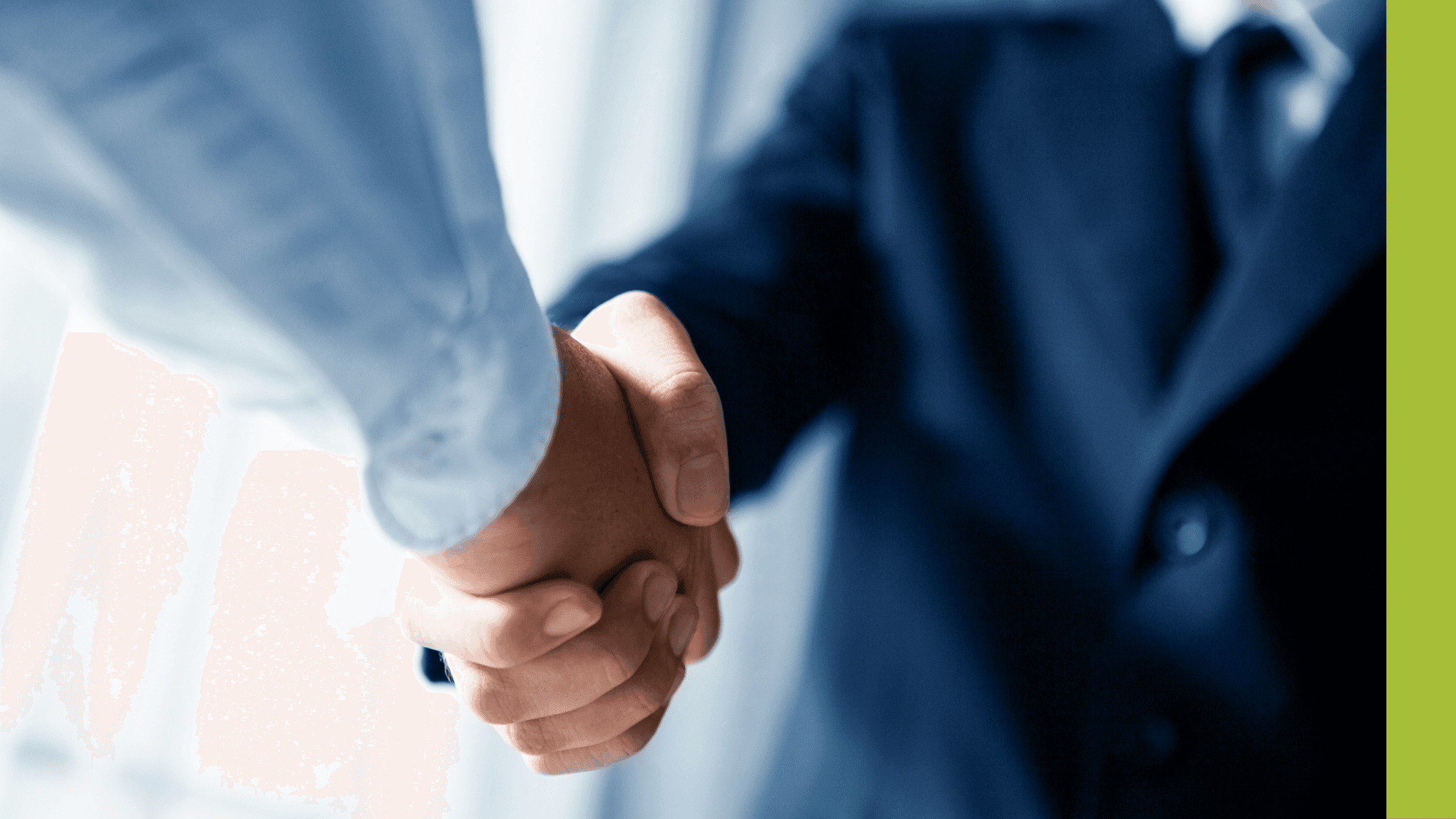 Businessmen in blue shake hands