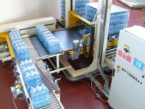 Water bottles on a conveyor ready to be palletised