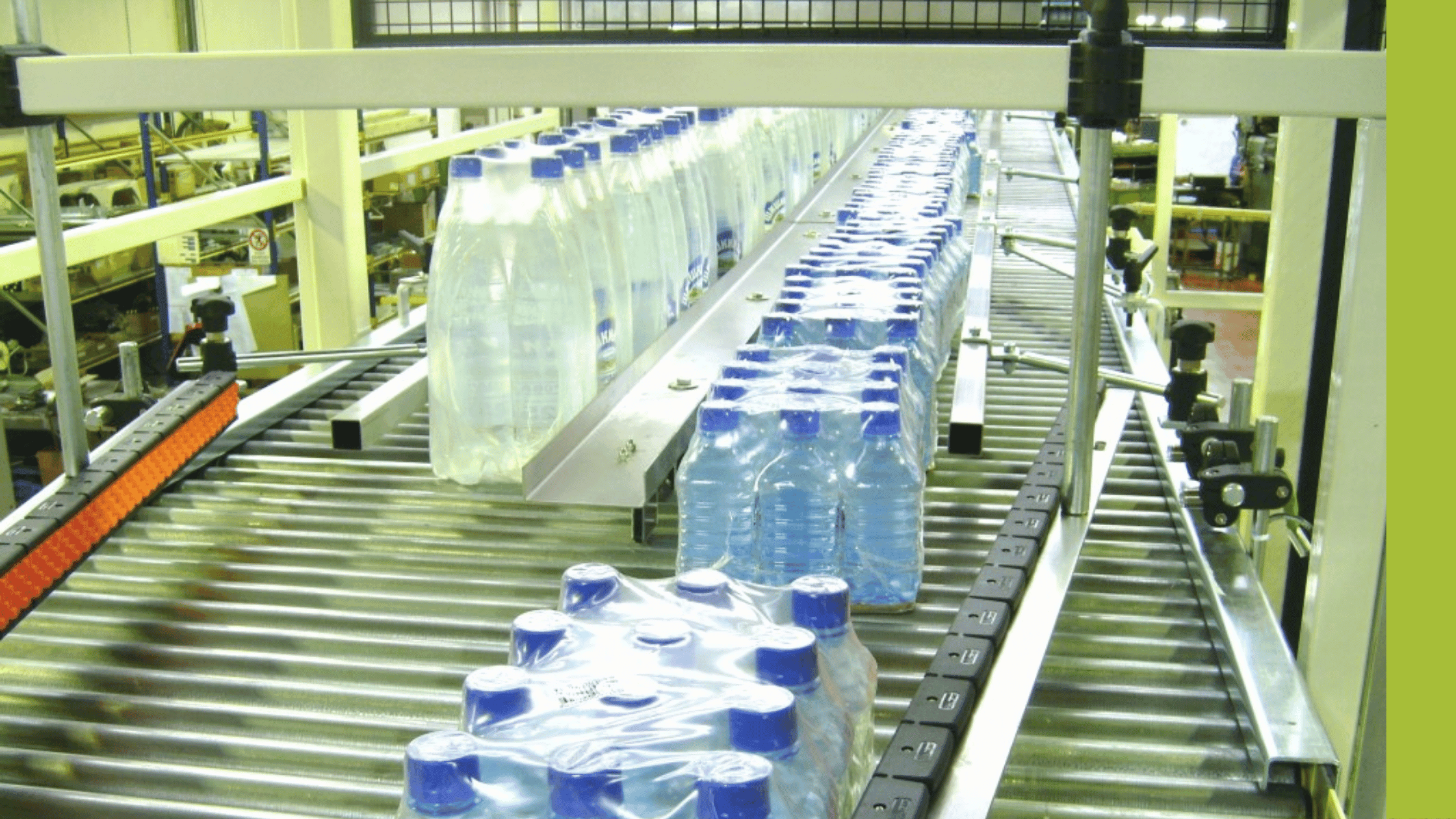 Water bottles passing through an automated conveyor