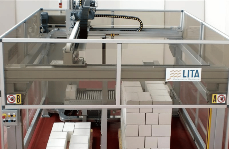 A Lita automation system lifts boxes