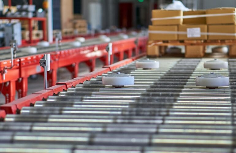 cardboard boxes on an automated production belt